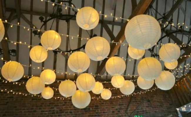 Balls of Lanterns with Festoon and Fairy Lights | 21 Stunning Wedding Lighting Ideas Using Festoon And Fairy Lights