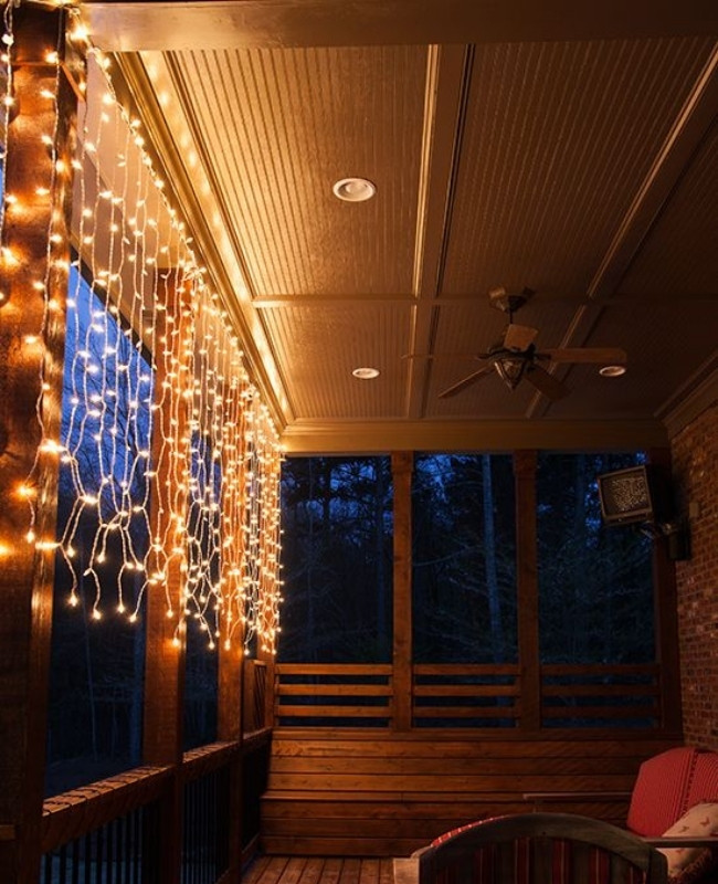 fairy lights hanged vertically in the verandah | Verandah Lighting Ideas