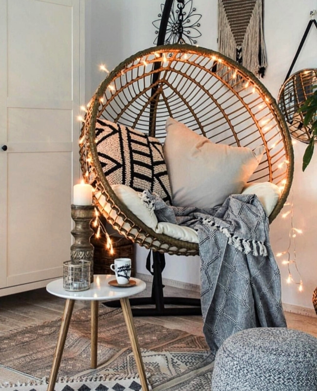 hanging chair decorated with fairy lights