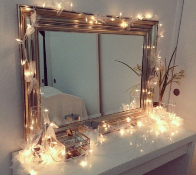 fairy lights decorated on the vanity mirror | fairy light idea