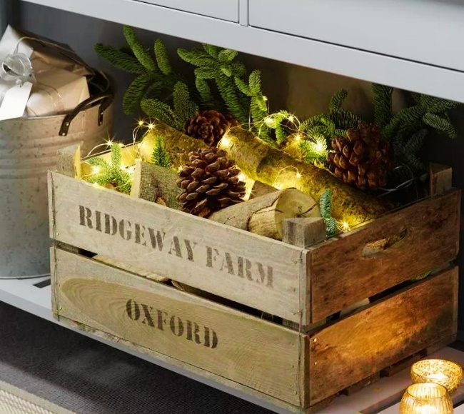 wooden crates loaded with acorn, leaves, chopped woods, and fairy lights
