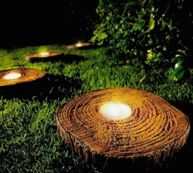 lighted tree stumps landscape lighting ideas